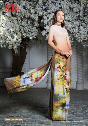 Made-to-measure ao dai by Mark&Vy using high quality, Thai Tuan fabric. Eye-catching yet elegant motif.