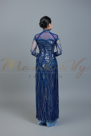 Custom Ao Dai featuring stunning lace over dark blue color chiffon lining