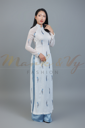 Custom Ao Dai featuring stunning sheer fabric over white chiffon