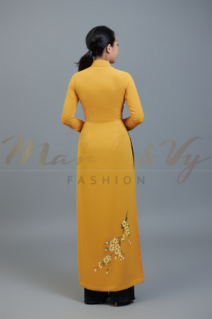 Custom made ao dai. Unique, hand-painted, floral motif on dark yellow fabric.