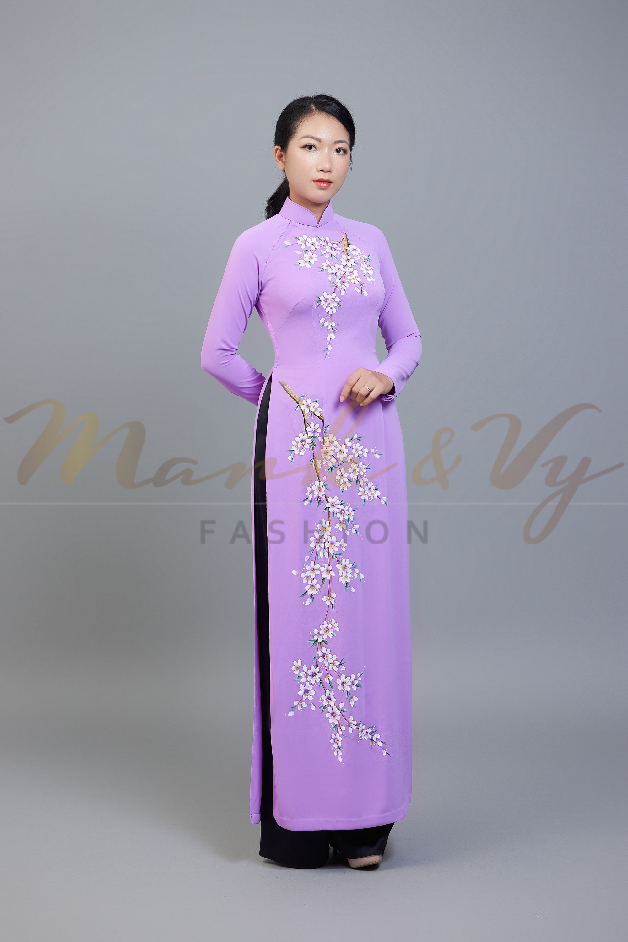 Custom made ao dai. Unique, hand-painted, floral motif on light purple fabric.