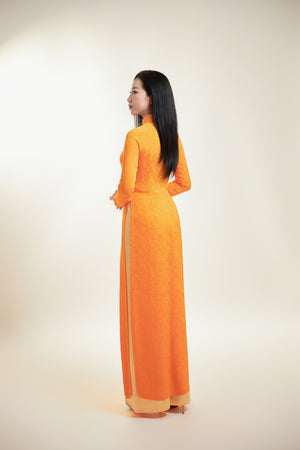Thai Tuan Silk Brocade Ao Dai in Orange with Leaf Pattern