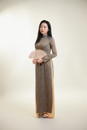 Thai Tuan Silk Brocade Ao Dai with Black and Gold Floral Pattern