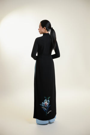 Back view of black silk Ao Dai with subtle floral hand-painted detail.