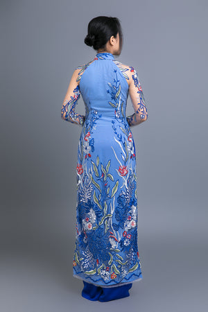 Custom Ao Dai. Multicolored, floral motif lace over light blue, chiffon fabric.