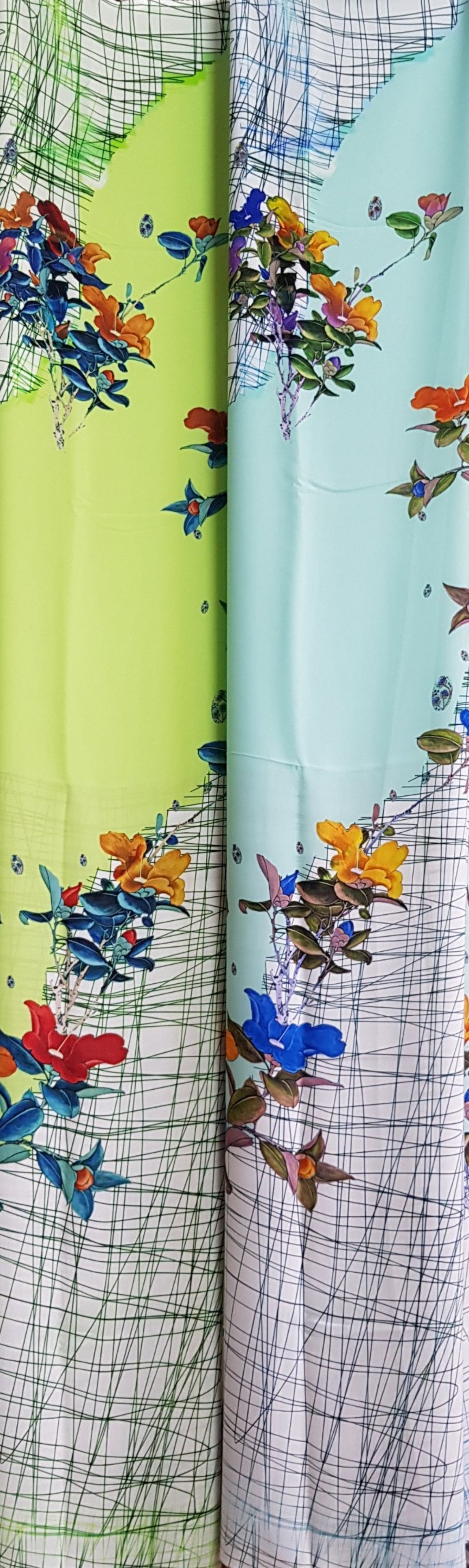 Made-to-measure ao dai by Mark&Vy using high quality, Thai Tuan fabric. Artistic, stylized, floral motif.