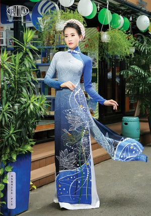 Made-to-measure ao dai by Mark&Vy using high quality, Thai Tuan fabric. Stylized lotus motif,