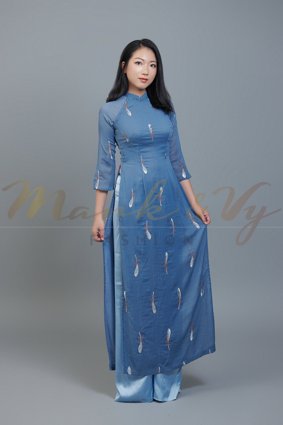 Custom Ao Dai featuring stunning sheer over blue chiffon