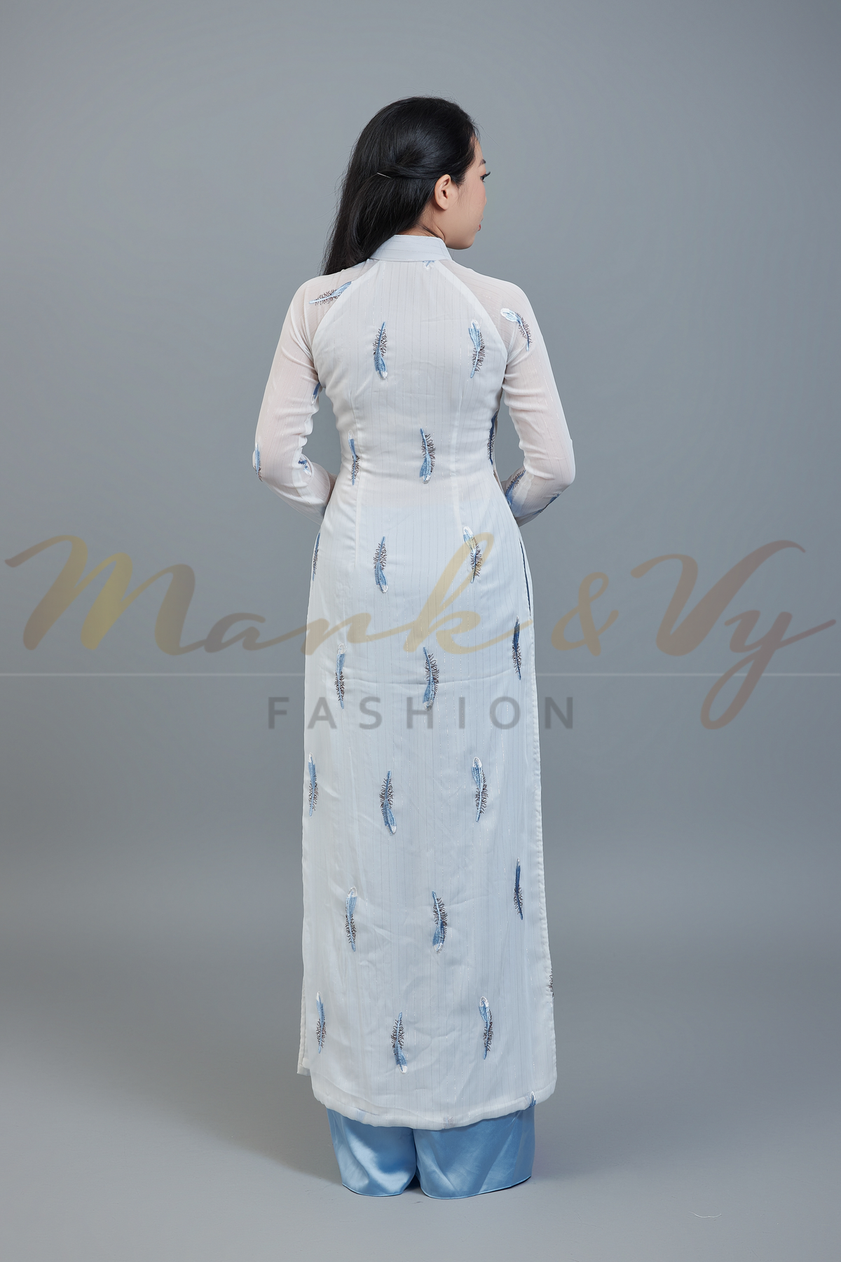 Custom Ao Dai featuring stunning sheer fabric over white chiffon