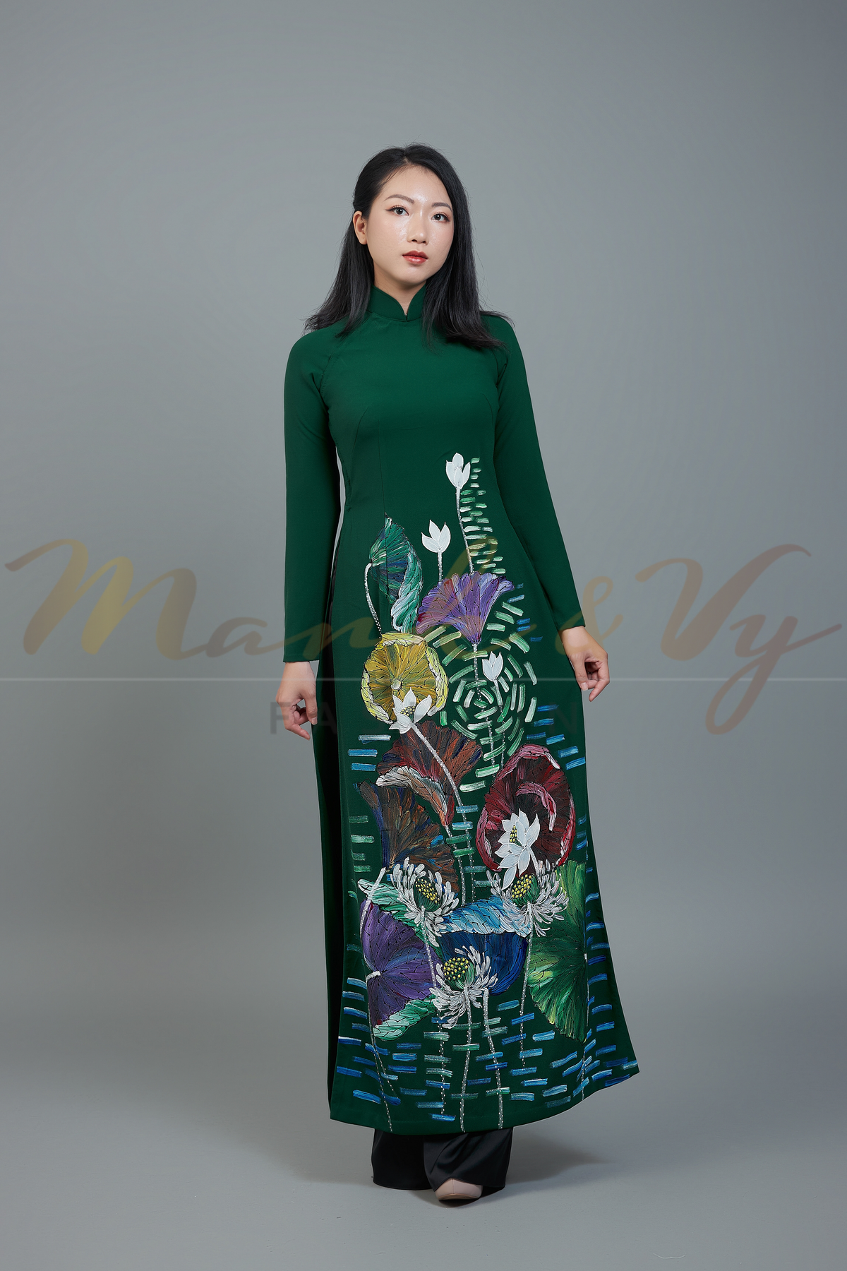 Custom made ao dai. Unique, lotus hand-painted in elegant, dark green color.