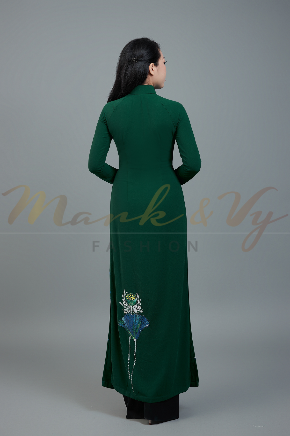 Custom made ao dai. Unique, lotus hand-painted in elegant, dark green color.