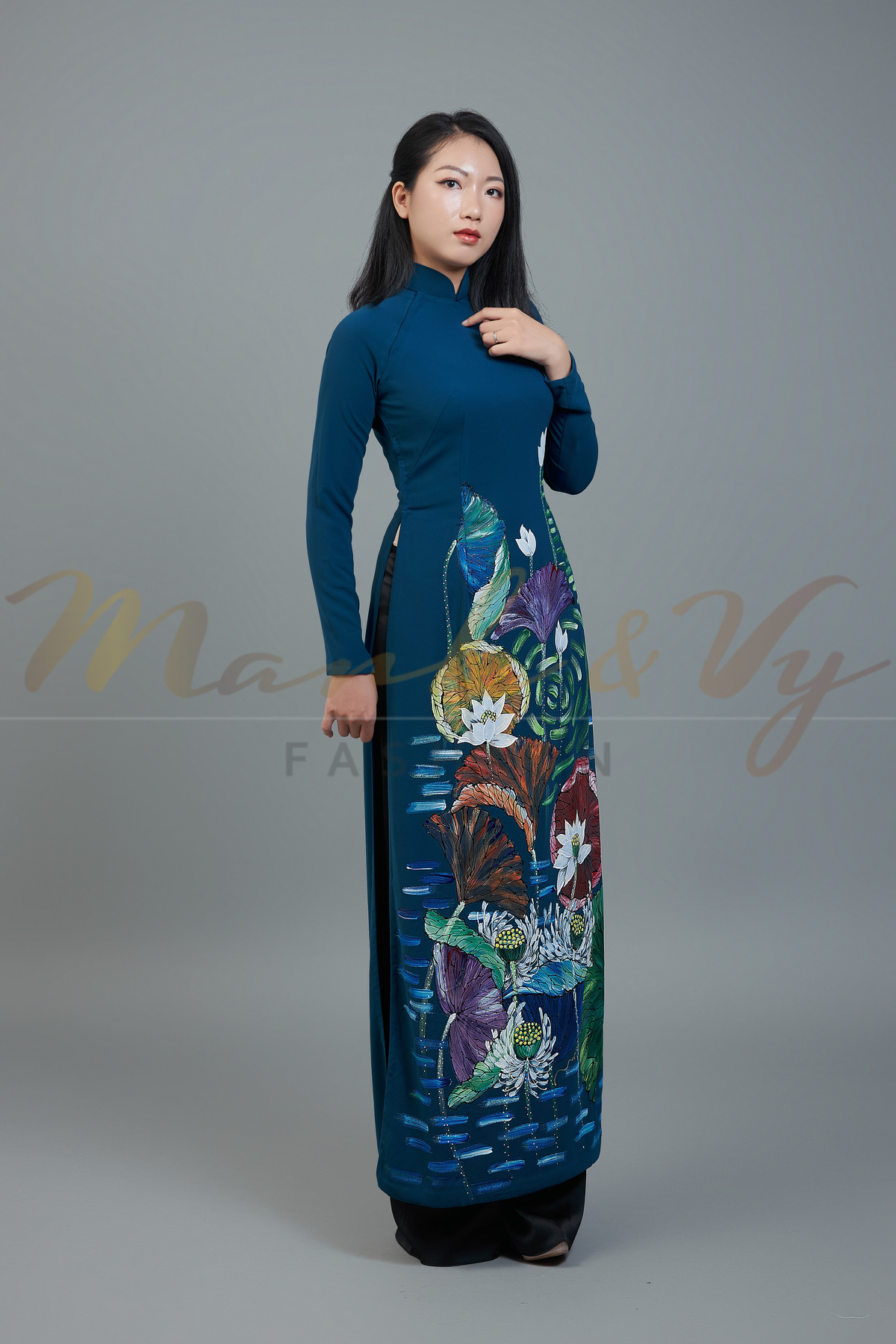 Custom made ao dai. Unique, hand-painted fabric in elegant teal color.