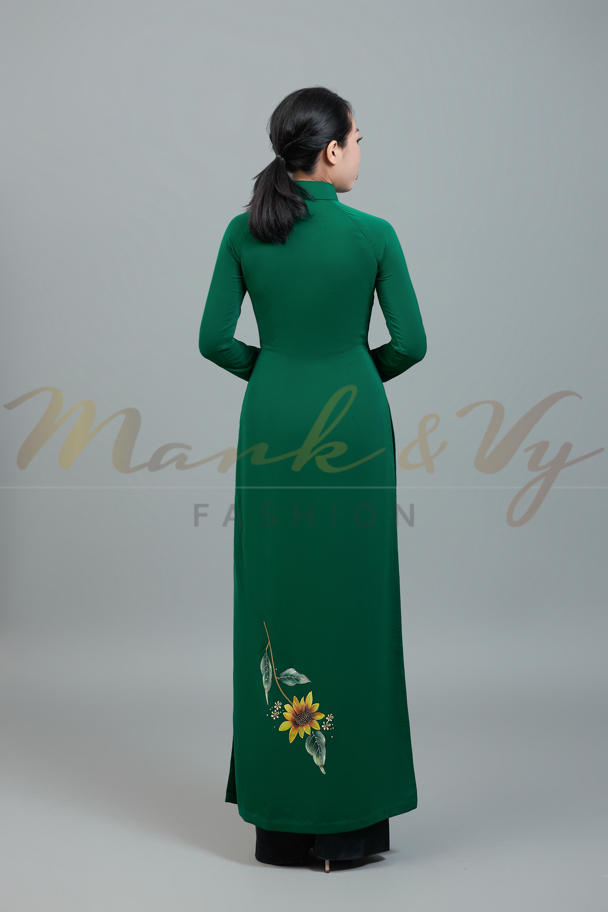 Custom made ao dai. Unique, hand-painted, floral motif on elegant, green fabric.