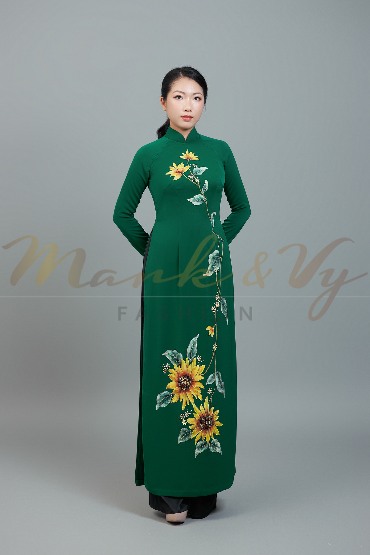 Custom made ao dai. Unique, hand-painted, floral motif on elegant, green fabric.