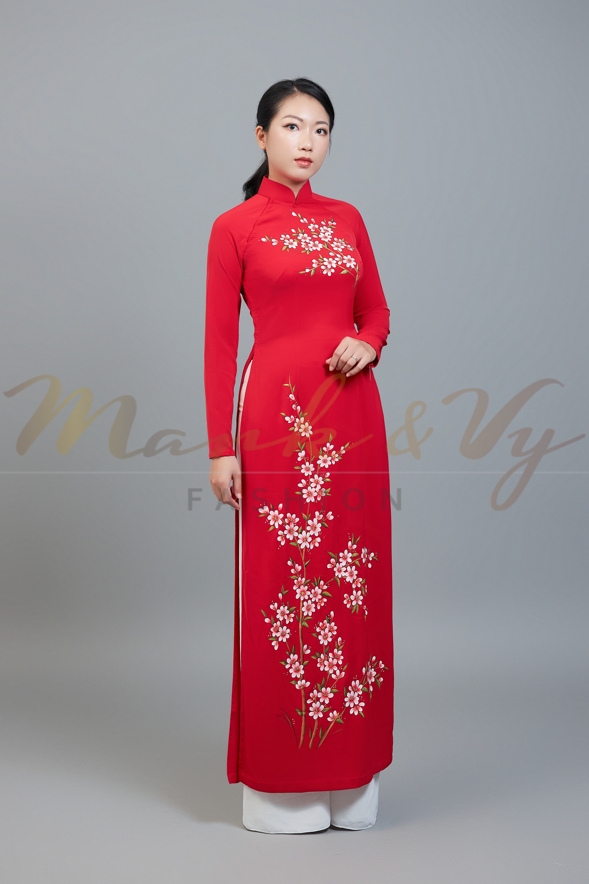 Custom made ao dai. Unique, hand-painted, floral motif on eye-catching, red fabric.