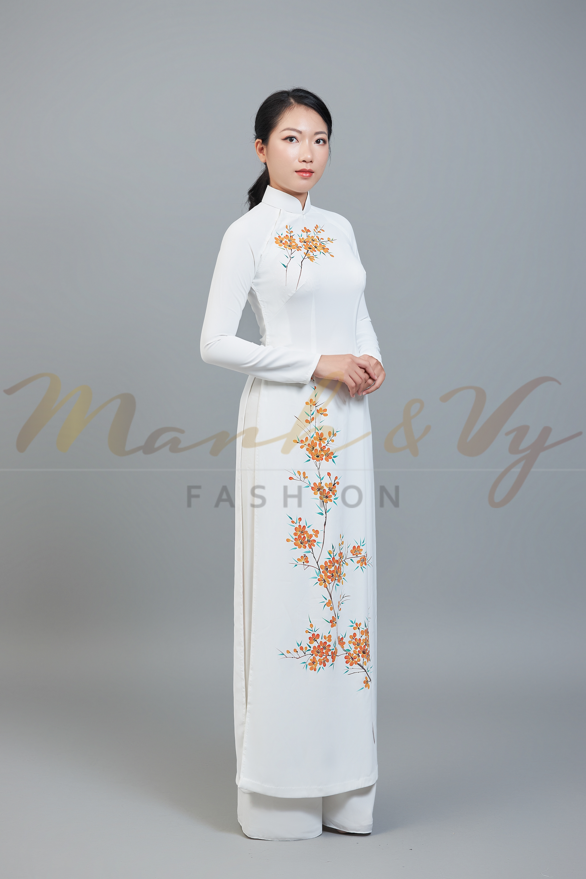Custom made ao dai. Unique, hand-painted, floral motif on stunning, white fabric.