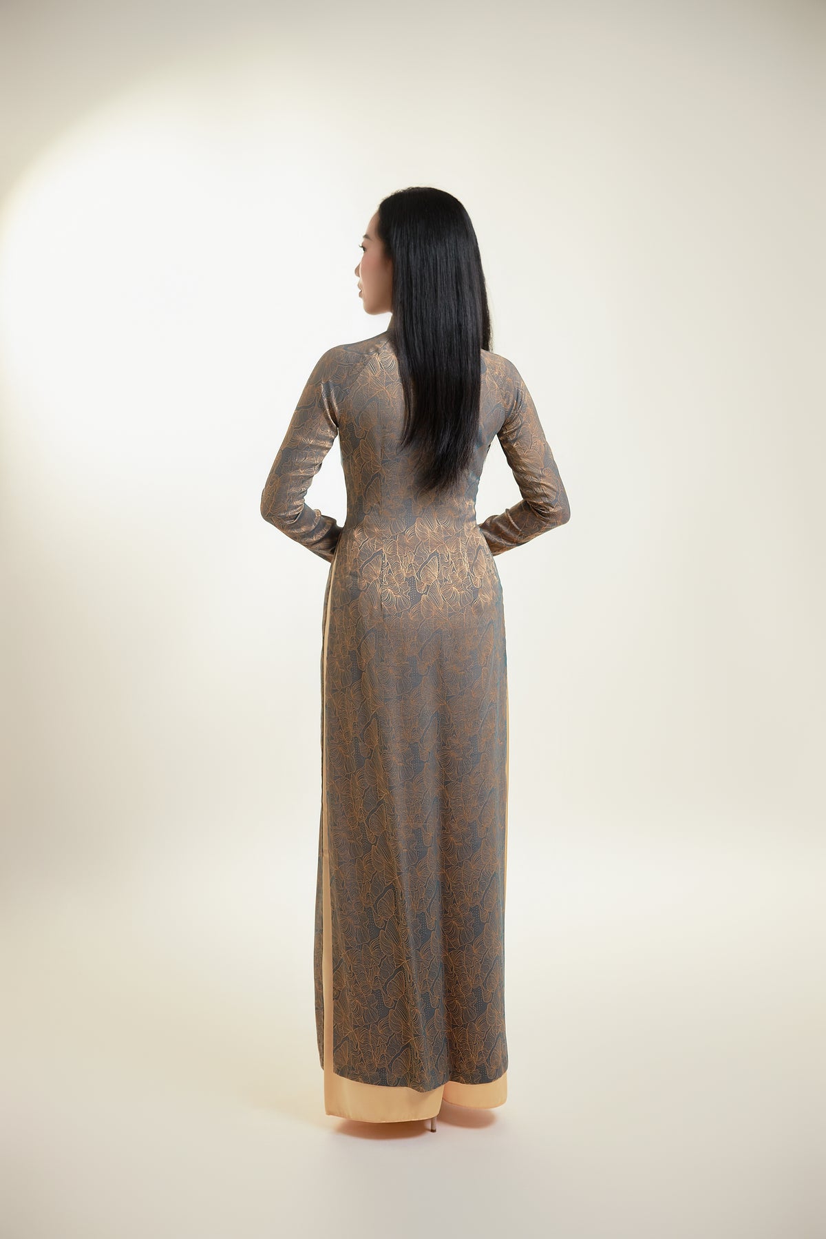 Thai Tuan Silk Brocade Ao Dai with Black and Gold Floral Pattern