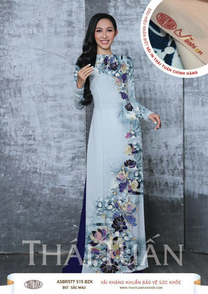 Made-to-measure ao dai by Mark&Vy using high quality, Thai Tuan fabric. Elegant floral motif.