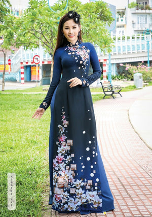 Made-to-measure ao dai by Mark&Vy using high quality, Thai Tuan fabric.  Pretty, flower blossom motif.