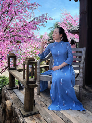 Custom Ao Dai featuring stunning sheer over blue chiffon