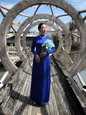 Thai Tuan Silk Brocade Ao Dai in Blue with Leaf Pattern