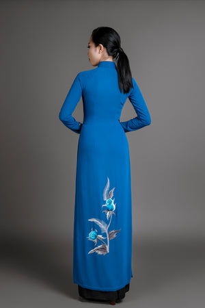 Ao dai Vietnam traditional dress. Blue silk long dress with stunning embroidered rose motif.