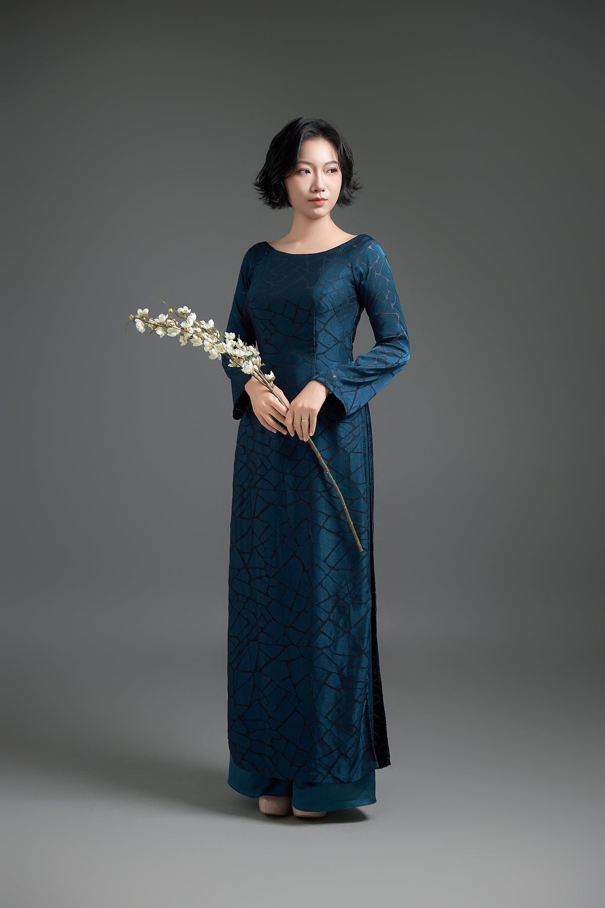 Teal Ao Dai with Cracked Detailing