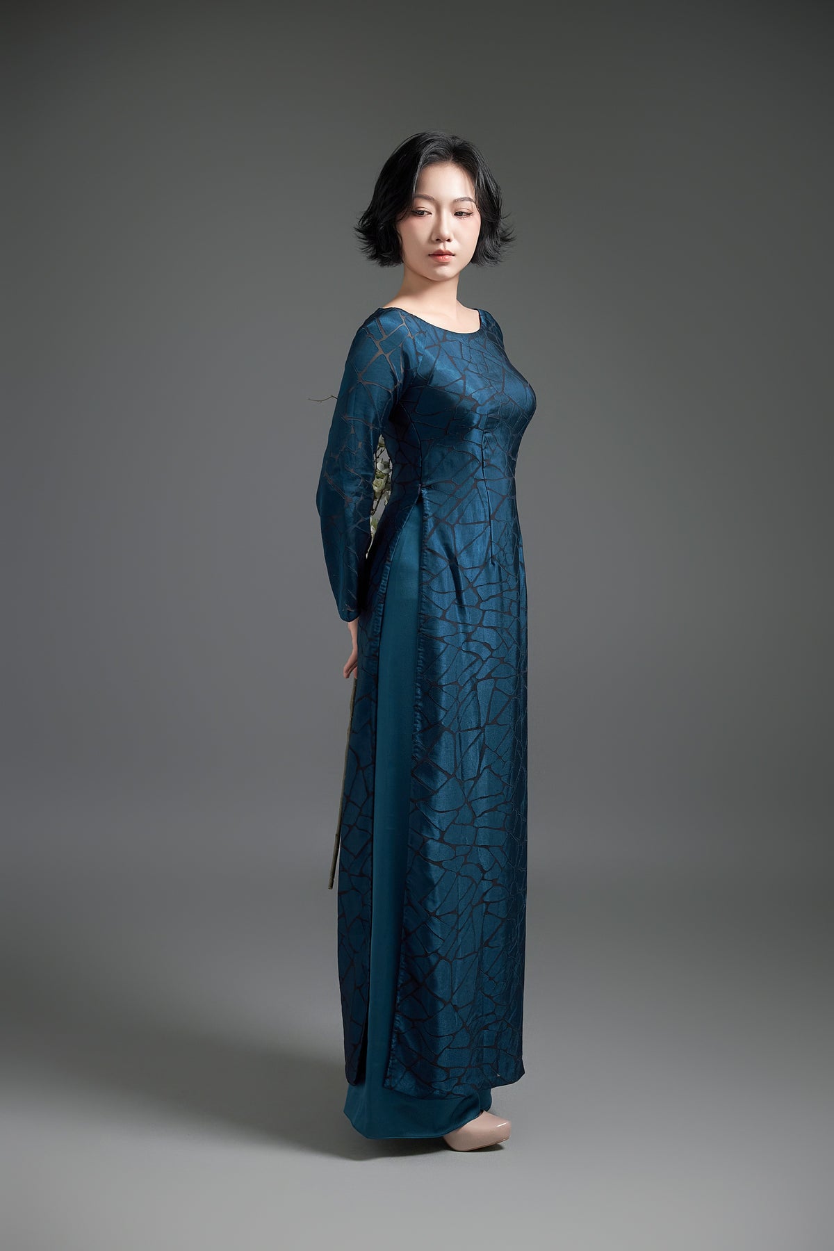 Teal Ao Dai with Cracked Detailing