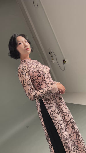 Black-Patterned Elegance on Pink Lace