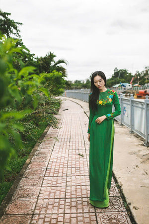 Green ao dai with beautiful embroidered floral design