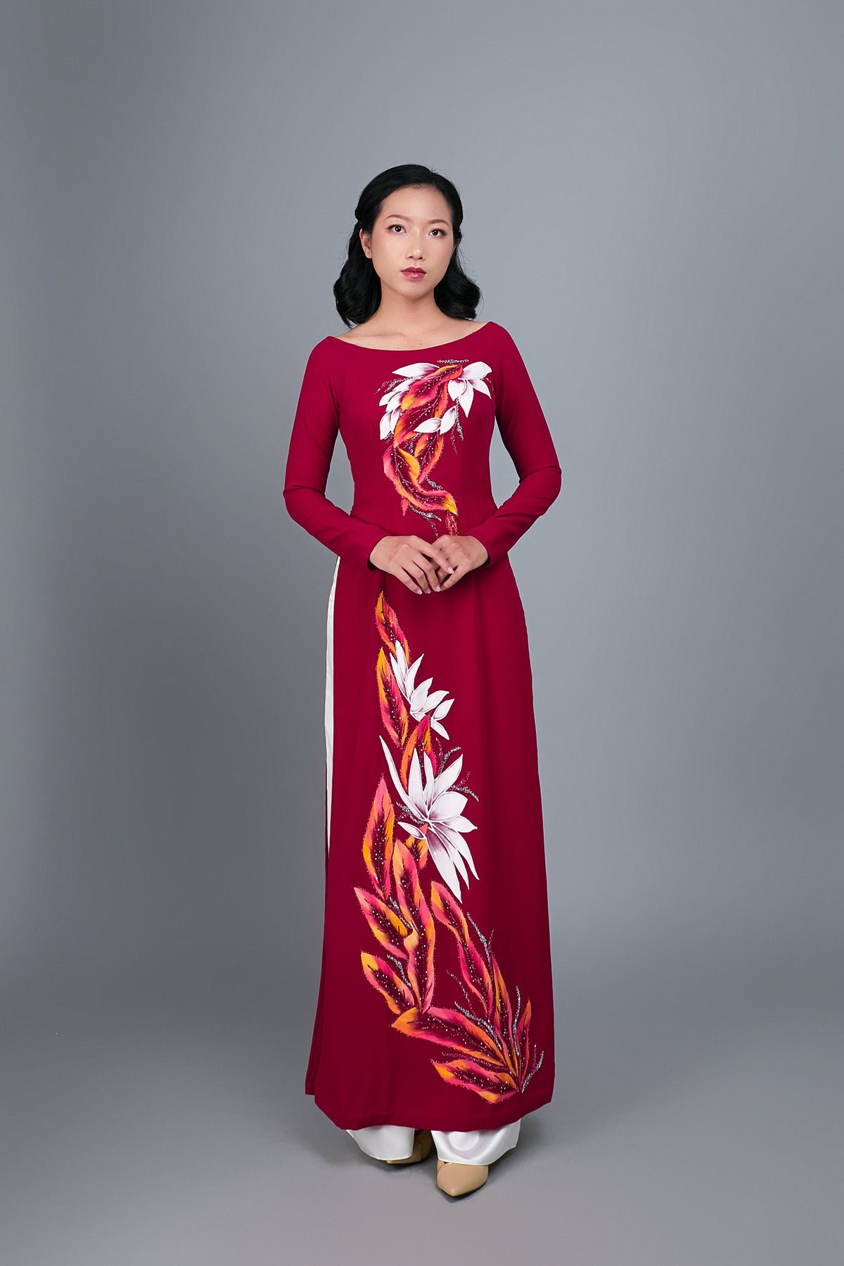Custom Ao Dai. Hand-painted floral motif on red silk