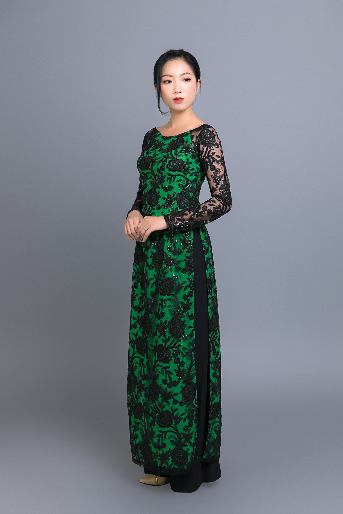 Custom Ao Dai. Black floral motif lace over green chiffon fabric. Mark Vy Ao Dai