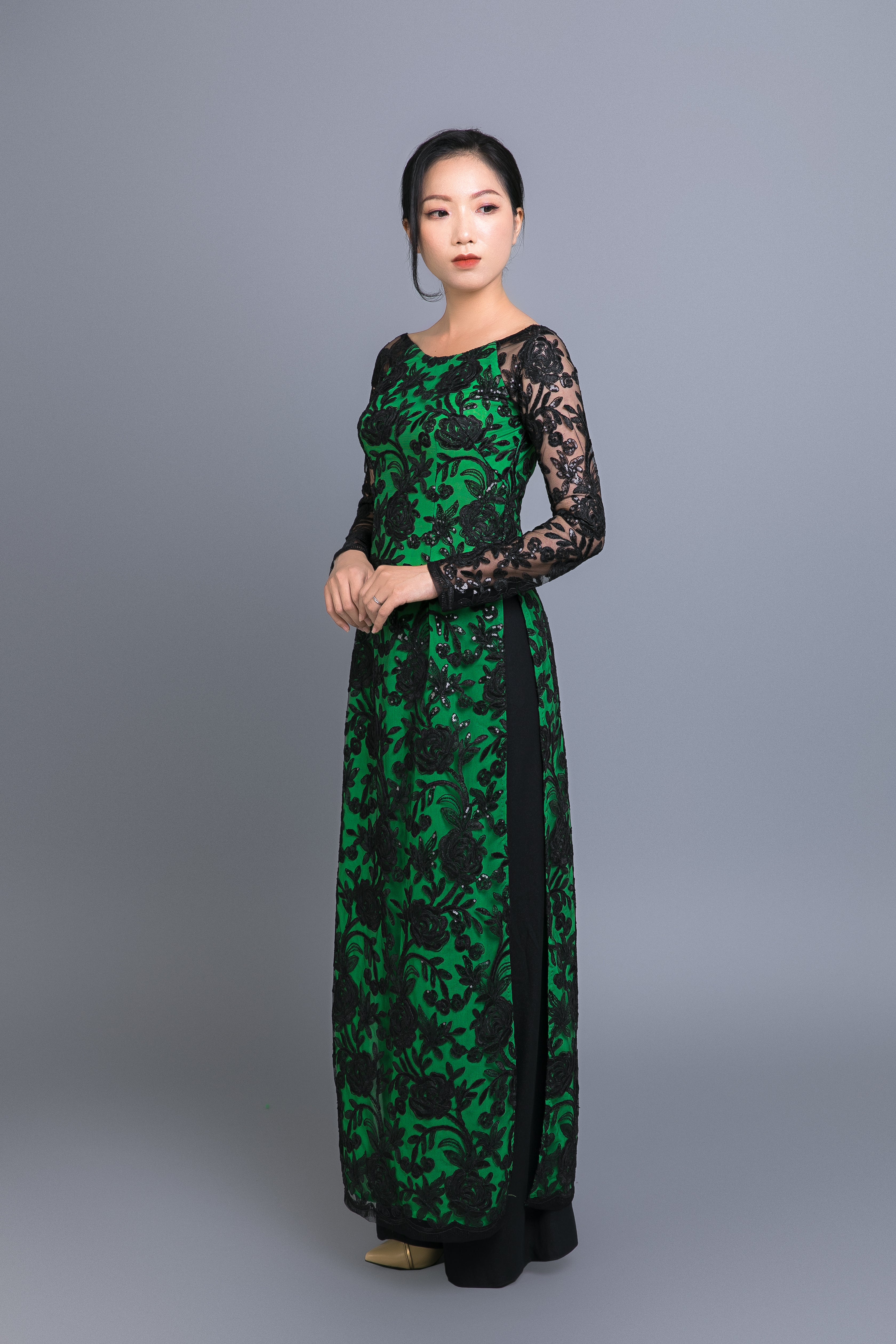 Custom Ao Dai. Black, floral motif lace over green, chiffon fabric
