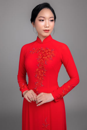Made to measure, red ao dai with elegant, beaded and embroidered floral details. Perfect for wedding or any special occasion.