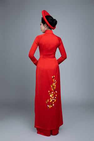 Custom made Vietnamese ao dai dress in red with embroidered, peacock motif