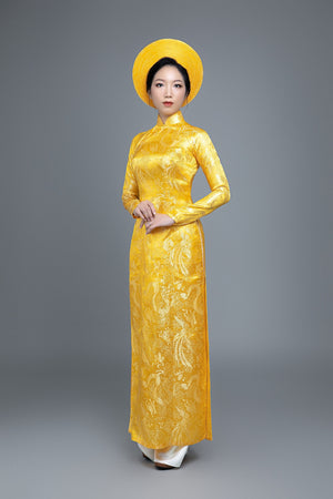Custom made Vietnamese ao dai dress in yellow brocade fabric with phoenix and dragon motif