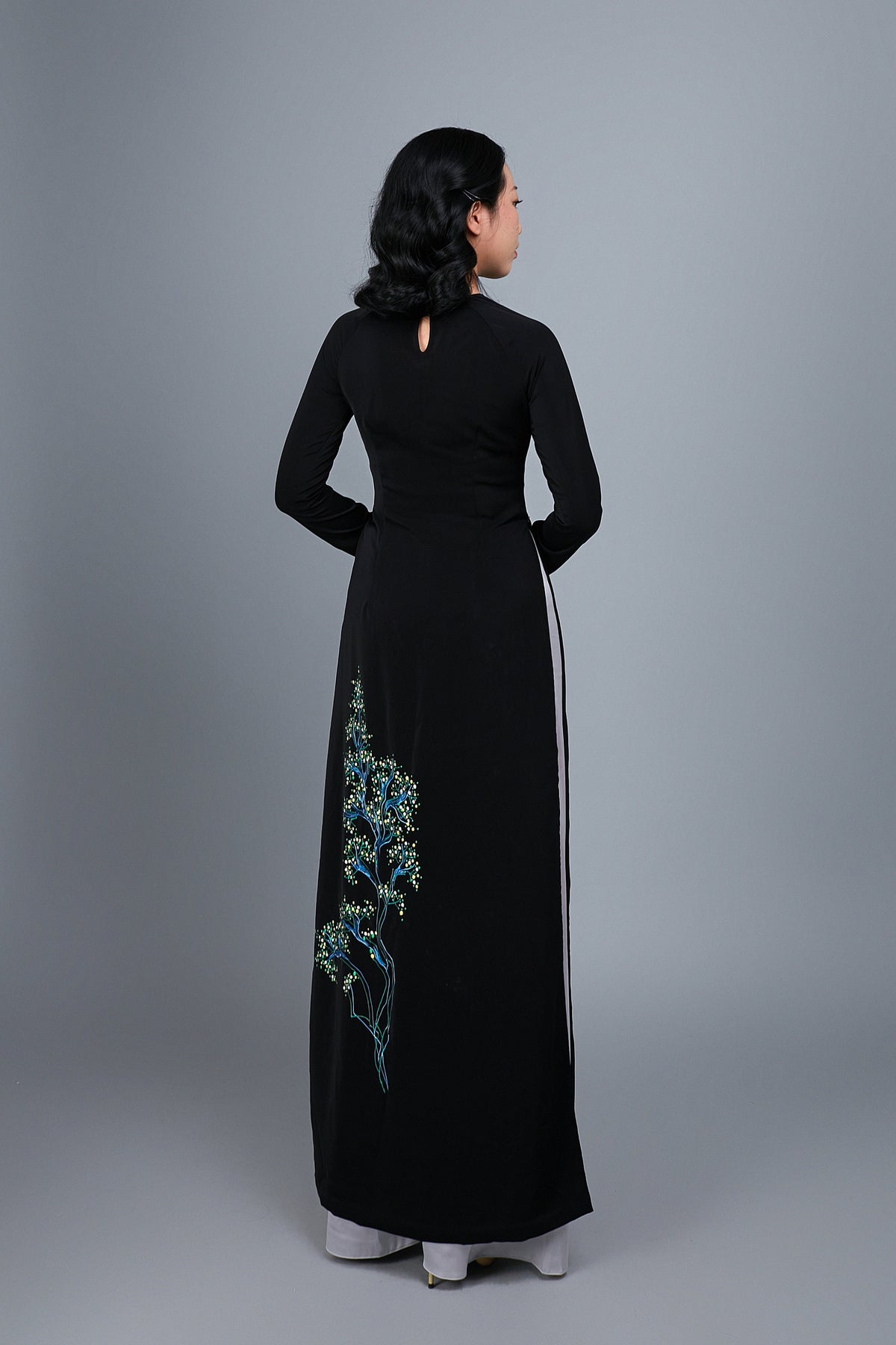 Custom made ao dai. Hand-painted peacock motif on black silk