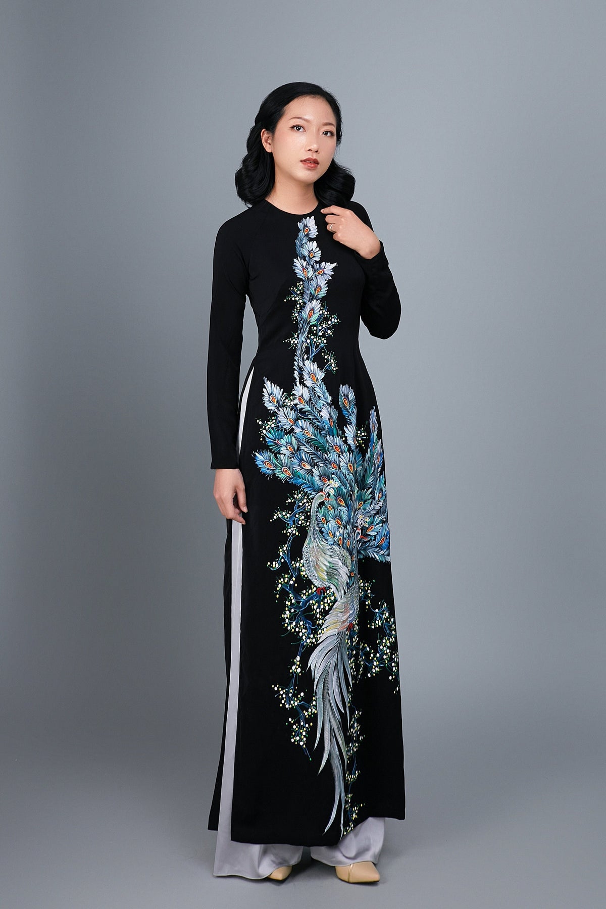 Custom made ao dai. Hand-painted peacock motif on black silk