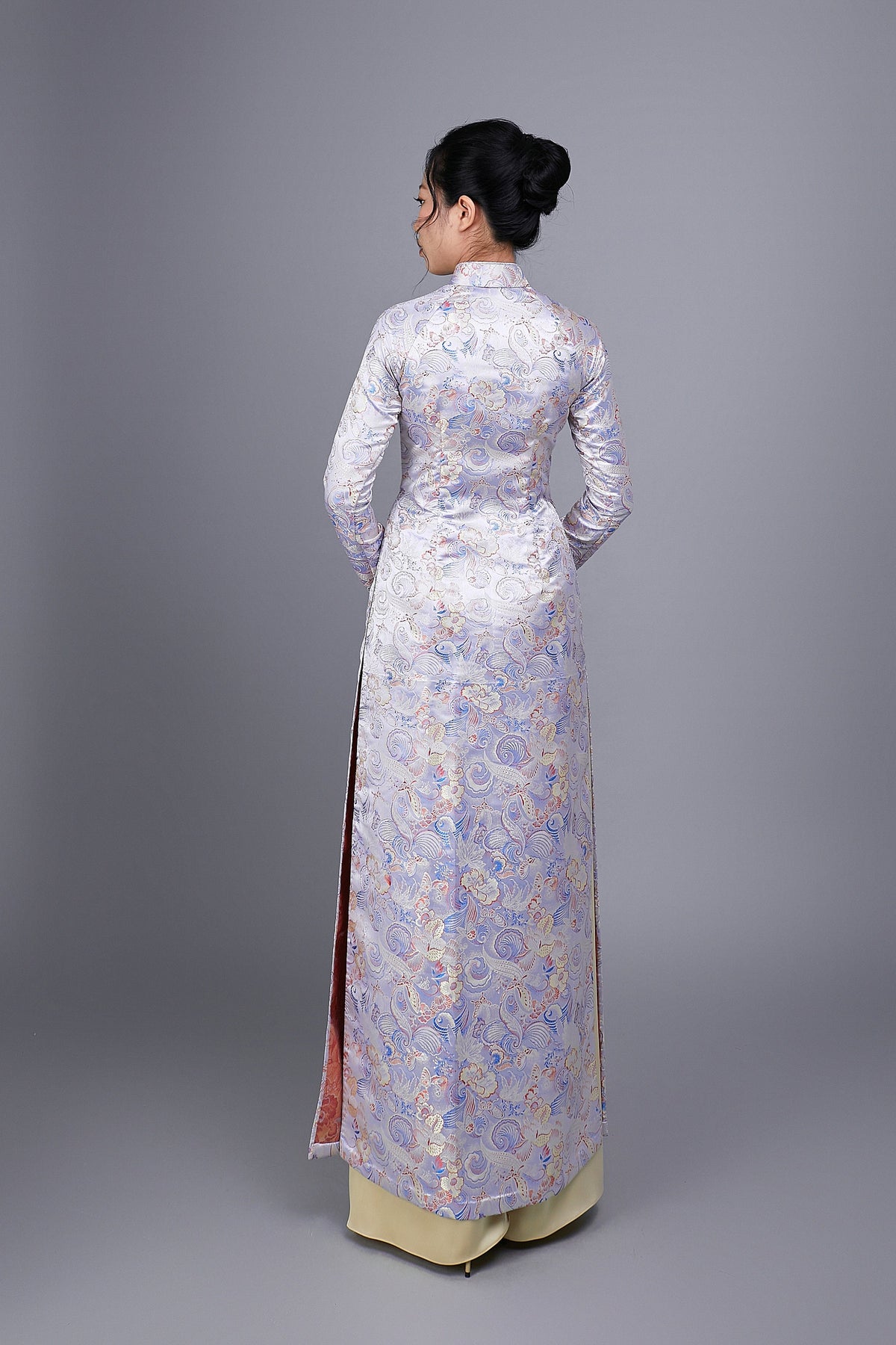 Custom made Vietnamese ao dai dress in white brocade fabric; butterfly and flower motif.