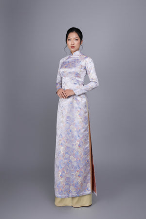 Custom made Vietnamese ao dai dress in white brocade fabric; butterfly and flower motif.