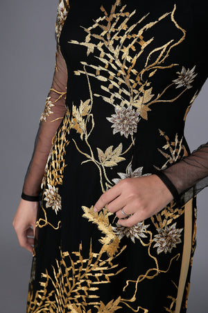 Custom Ao Dai. Floral motif lace over black chiffon fabric.