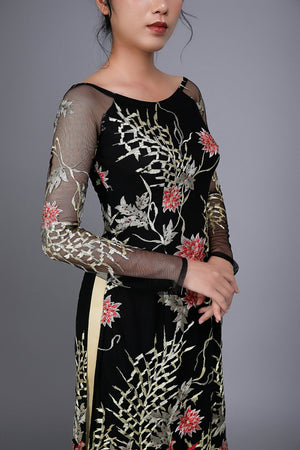 Custom Ao Dai (traditional Vietnamese dress). Floral motif lace over black chiffon fabric.