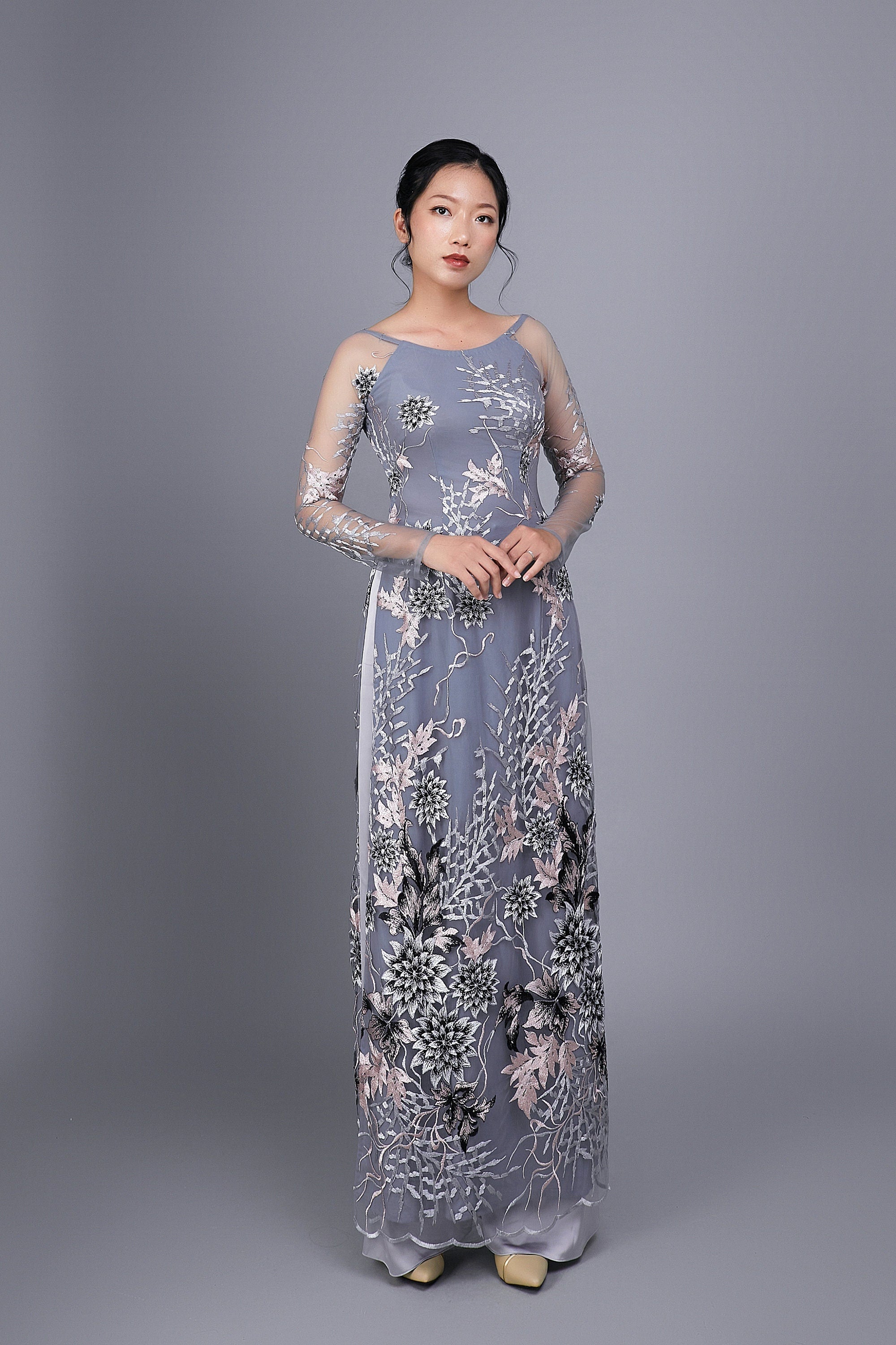 Custom Ao Dai. Floral motif lace over gray chiffon fabric.