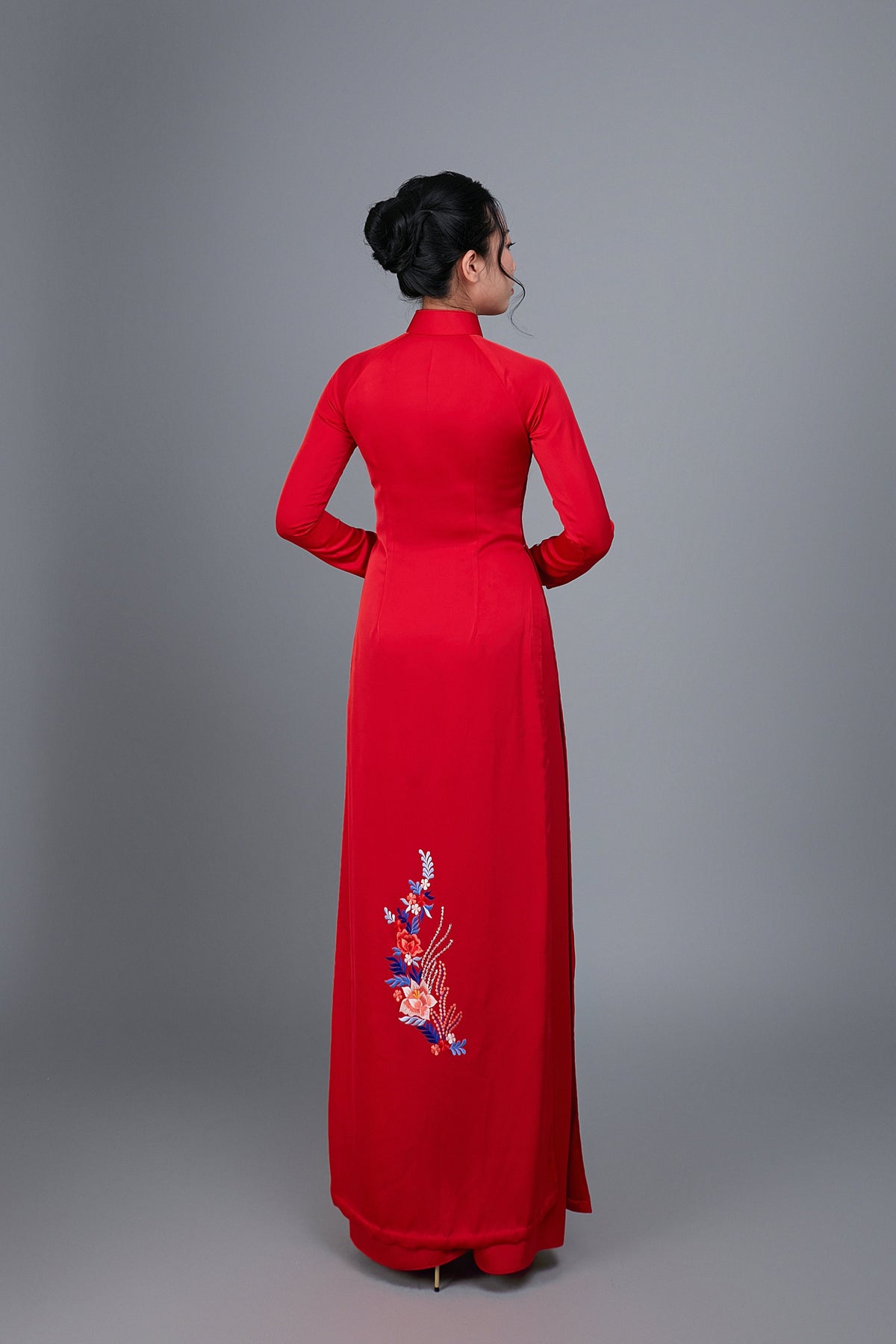 Women's ao dai dress Vietnamese traditional long dress. High quality red silk fabric with embroidered flower motif