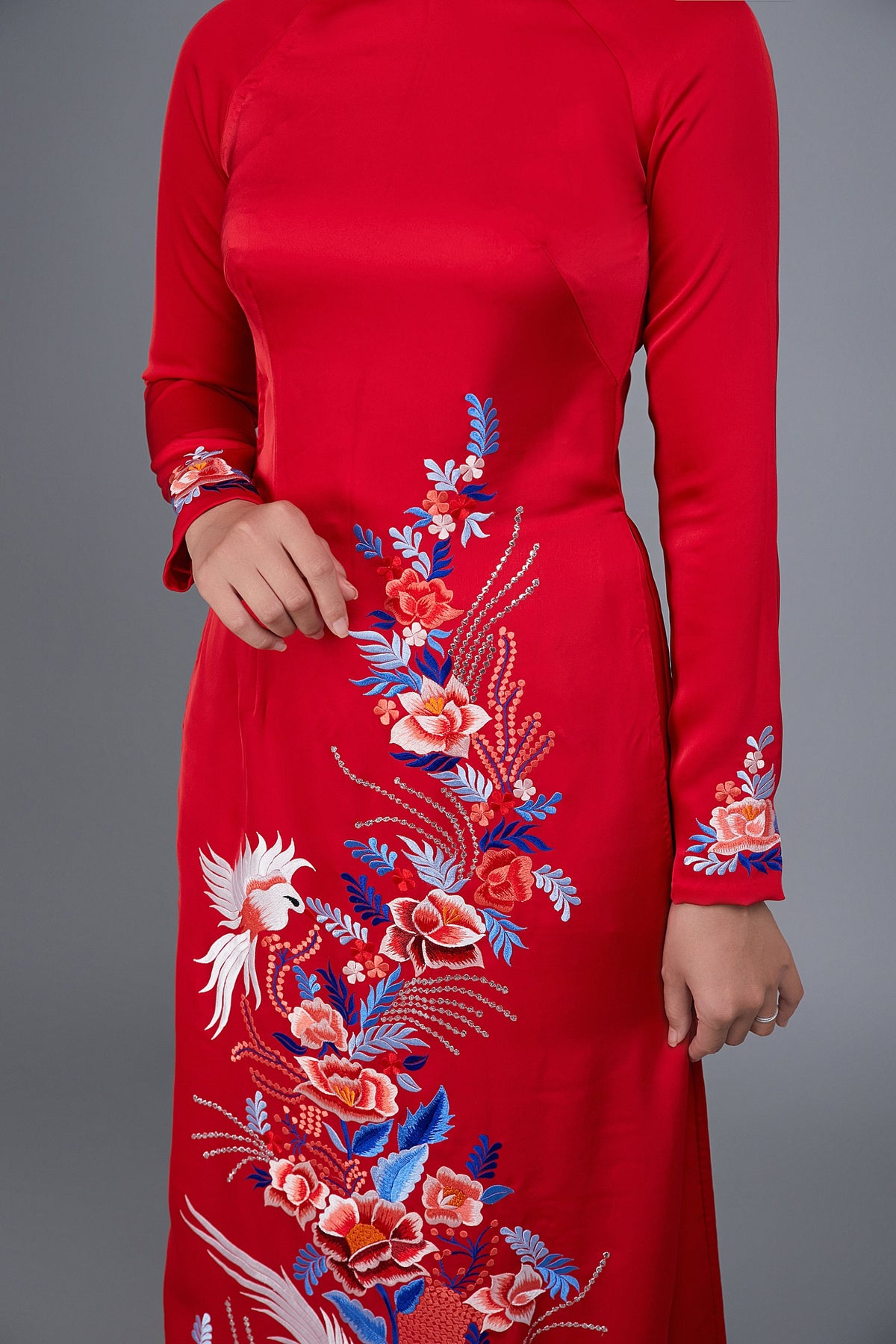 Women's ao dai dress Vietnamese traditional long dress. High quality red silk fabric with embroidered flower motif