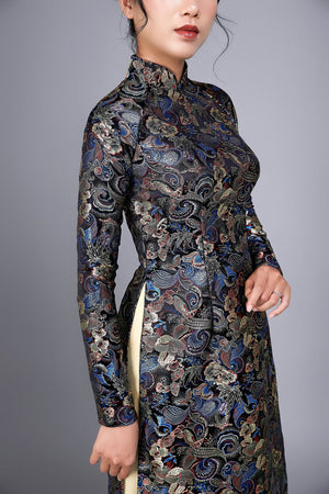 Custom made Vietnamese ao dai dress in black brocade fabric; butterfly and flower motif.