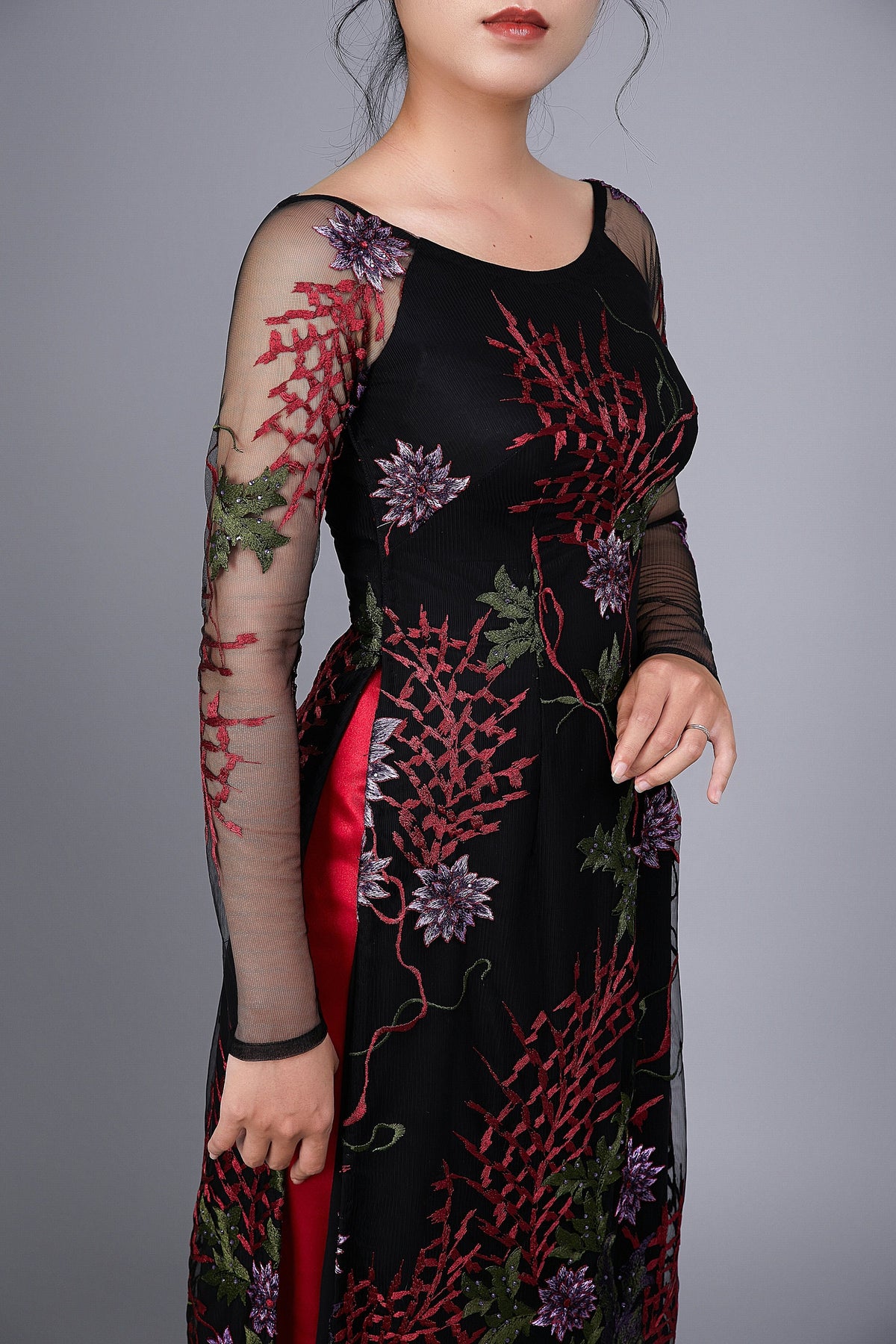 Custom Ao Dai. Floral motif lace over black chiffon fabric.