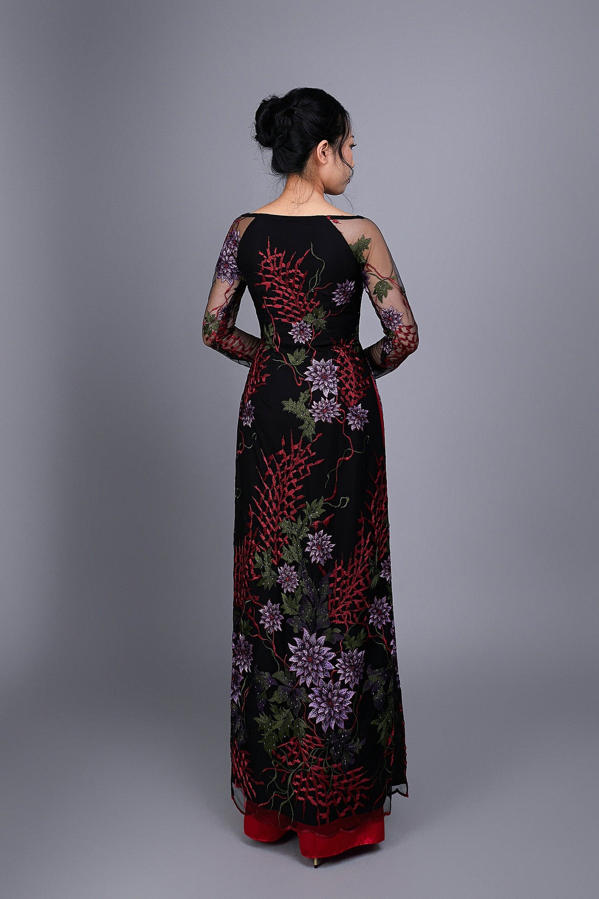 Custom Ao Dai. Floral motif lace over black chiffon fabric.
