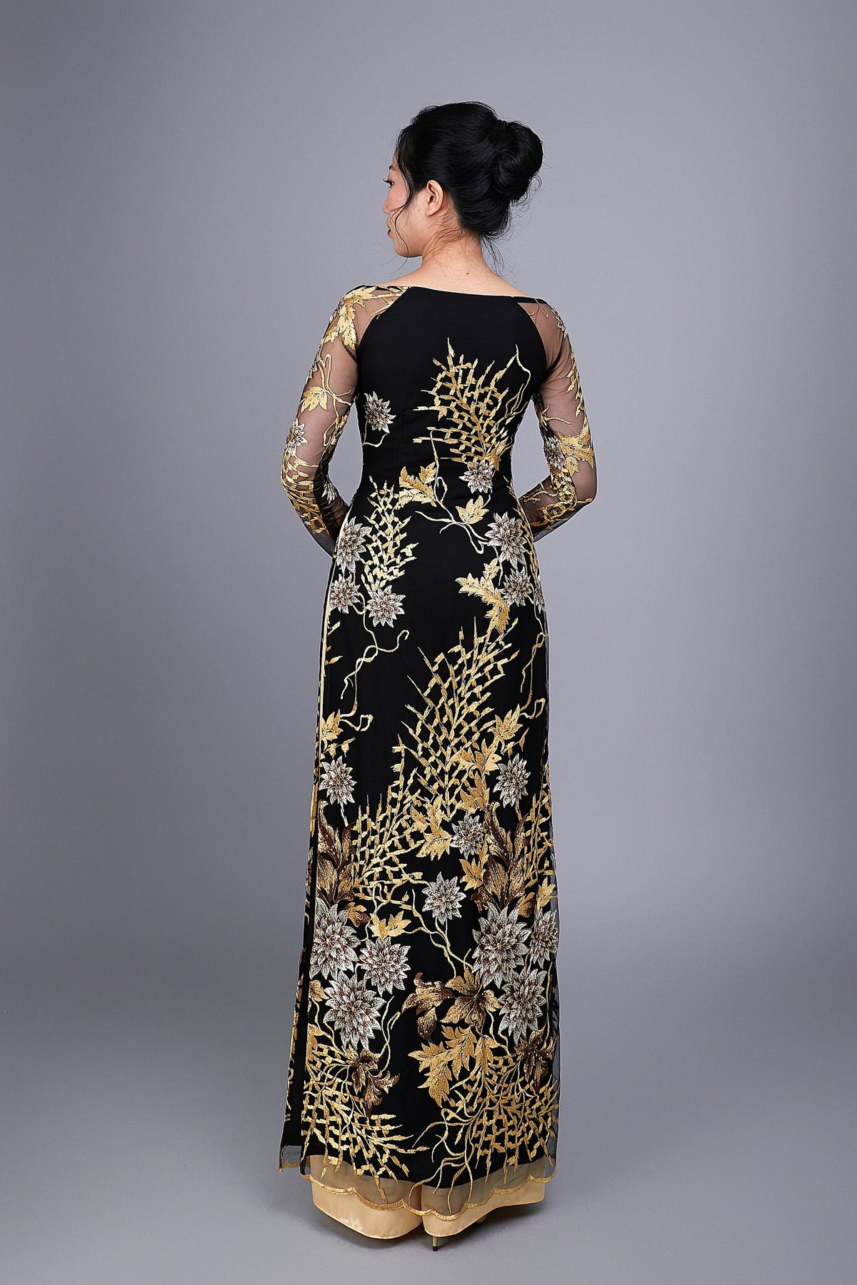 Custom Ao Dai. Floral motif lace over black chiffon fabric.