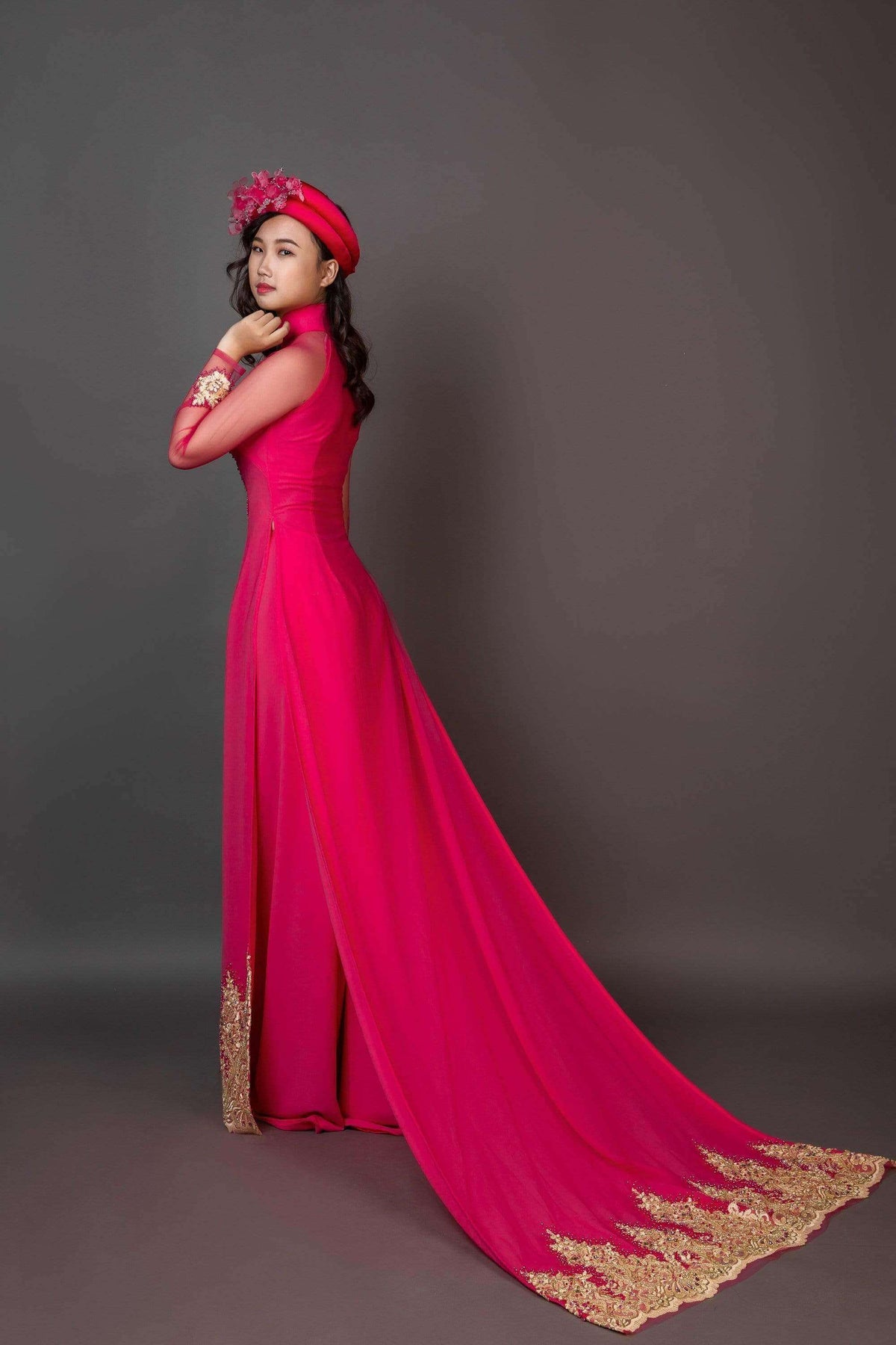 Mark&Vy Ao Dai Wedding ao dai with long train. Pink fabric with gold colored details.